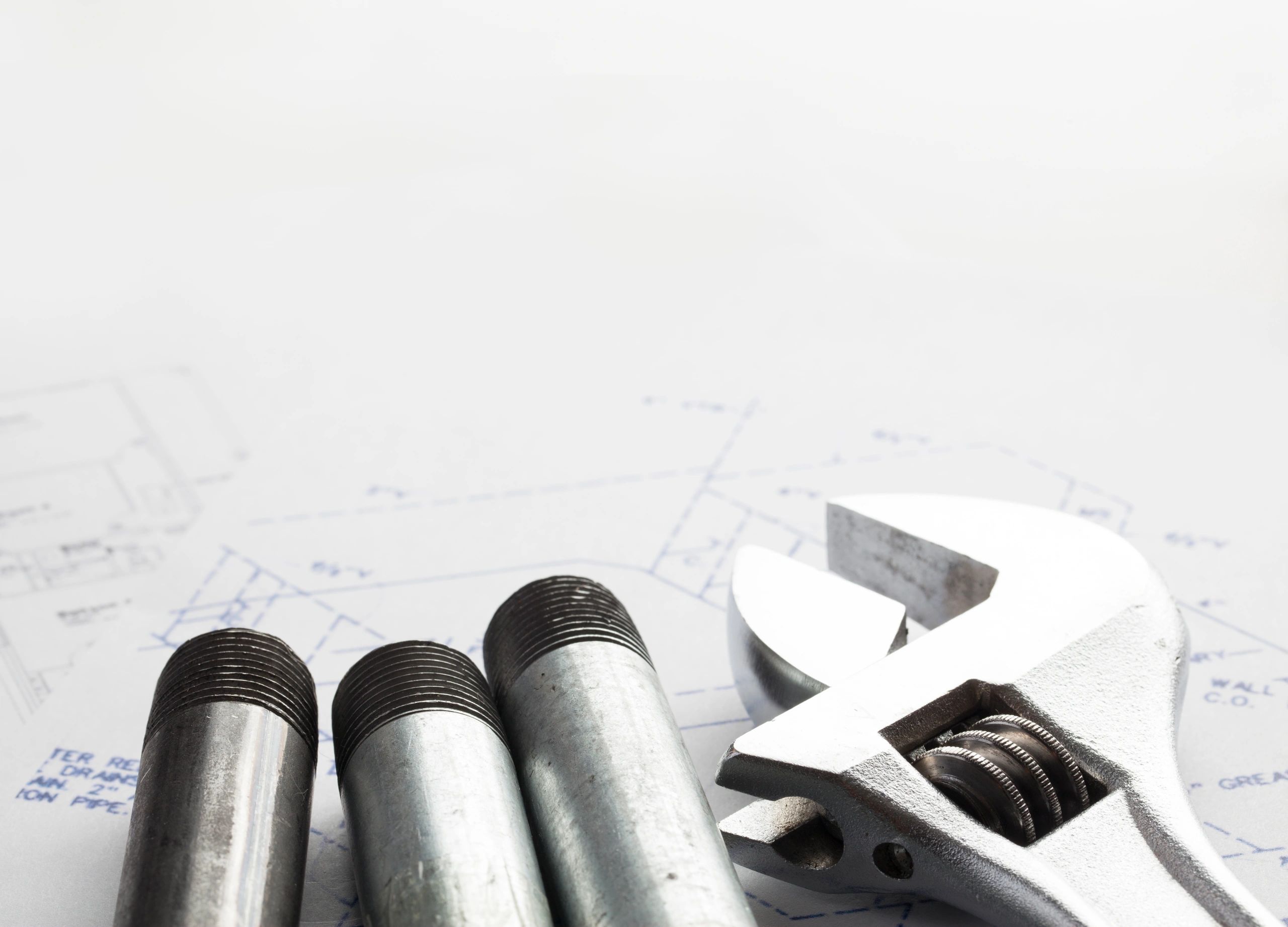Plumbing tools on work surface